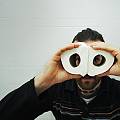 Man with a toilet paper camera