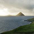 Faroe Islands: your typical  red house in a landspace.
